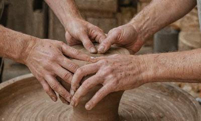 Beginner pottery class with instructor guidance